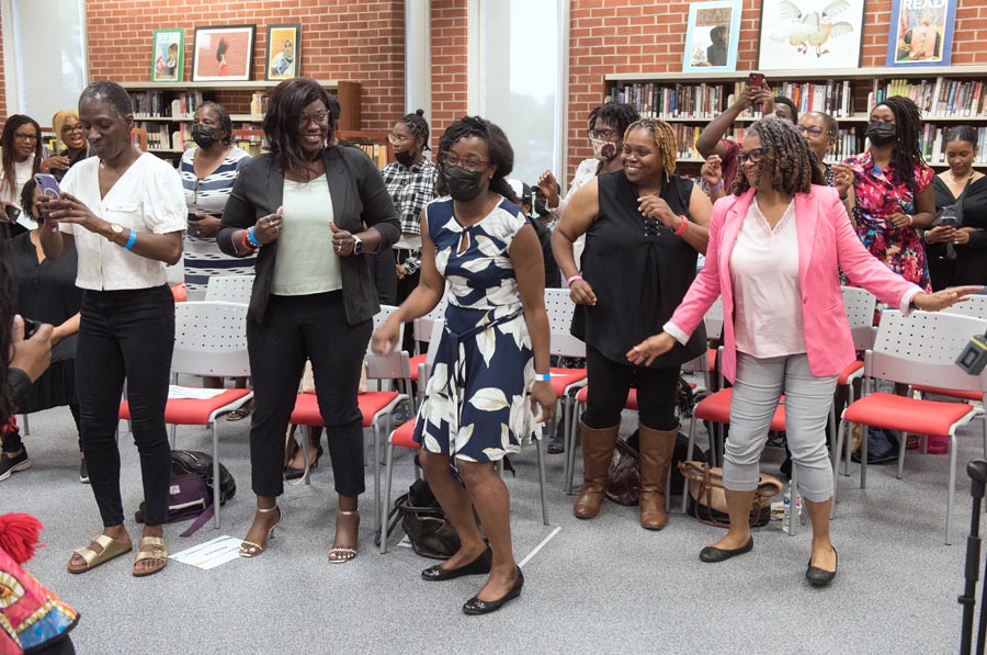 Audience members dancing. Open Gallery